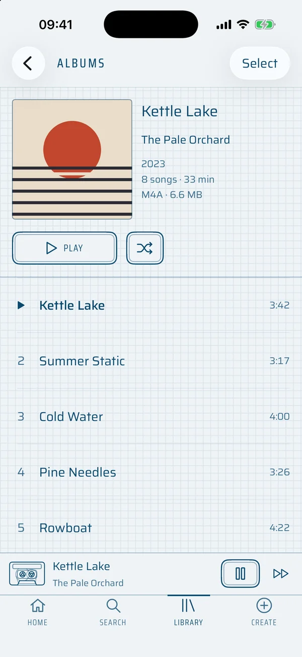 An album: cover, year, song count and size, Play and Shuffle, and its songs.